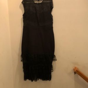 The type of dress in a ruffle down the dress. Size 2X .